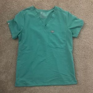 Size small one pocket figs top. Color is surgical green!